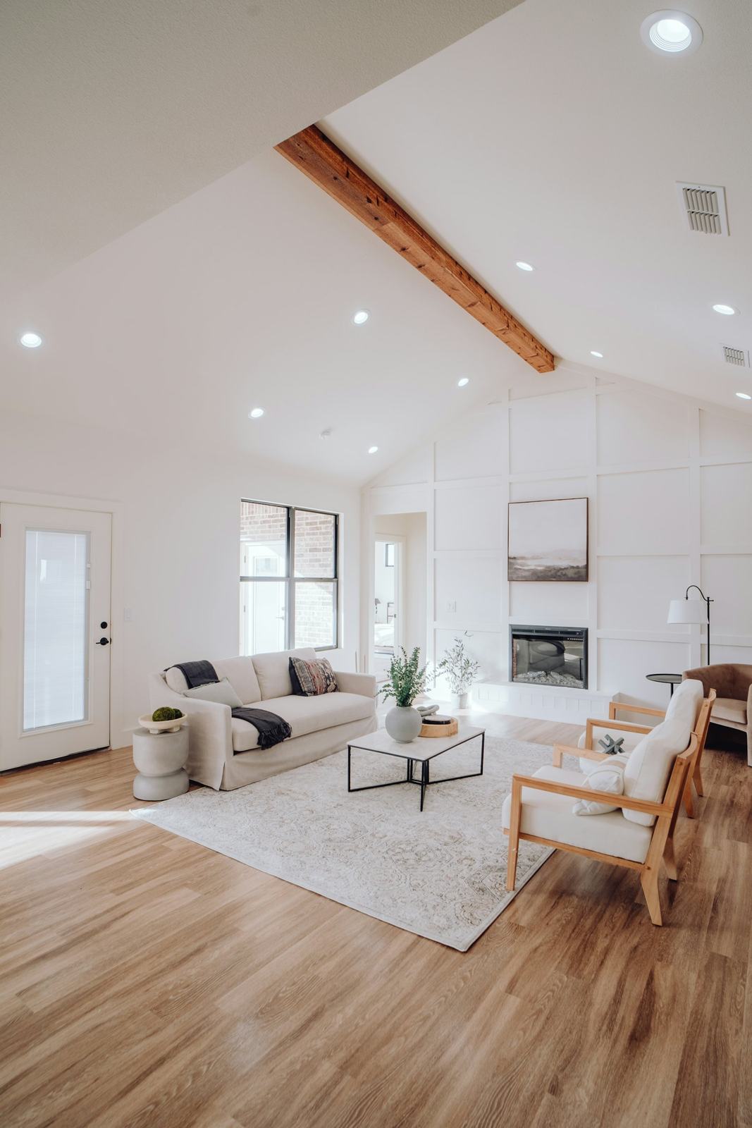 Sunny living room with wood floors